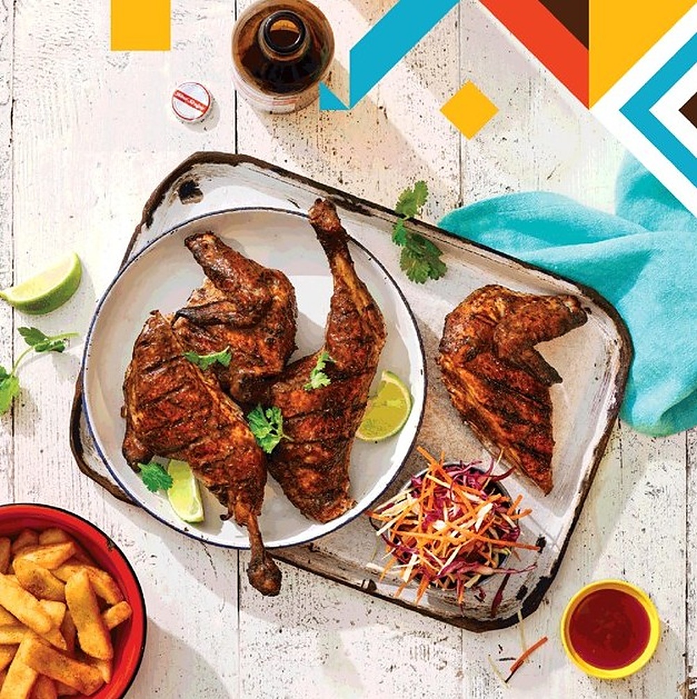 The Jerk food photography — grilled chicken platter